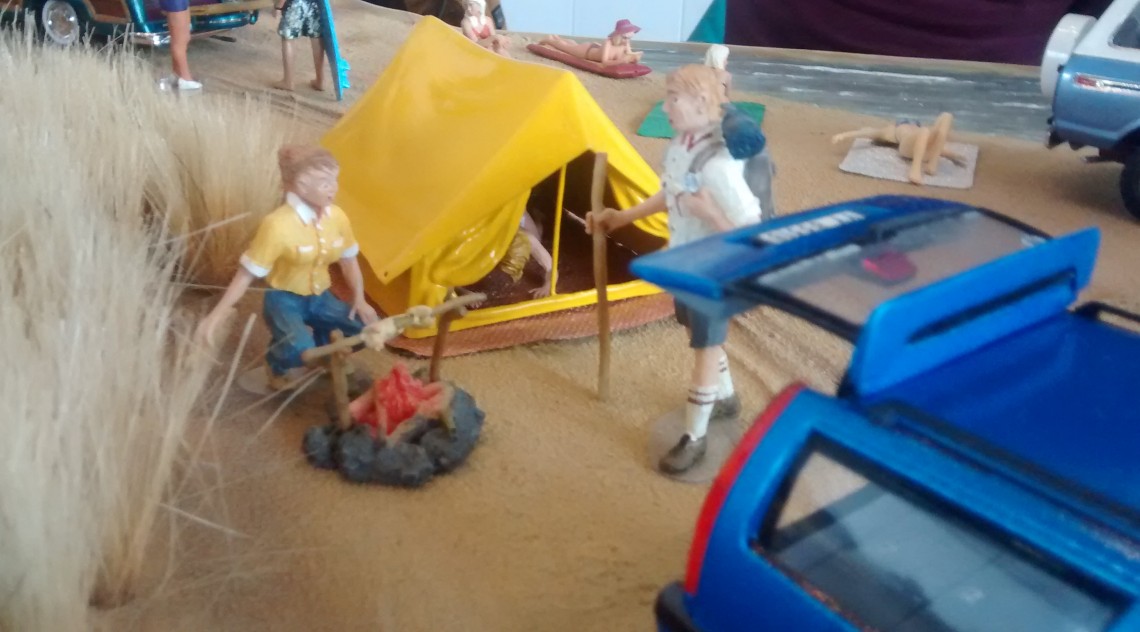 Strandszene mit Zelt