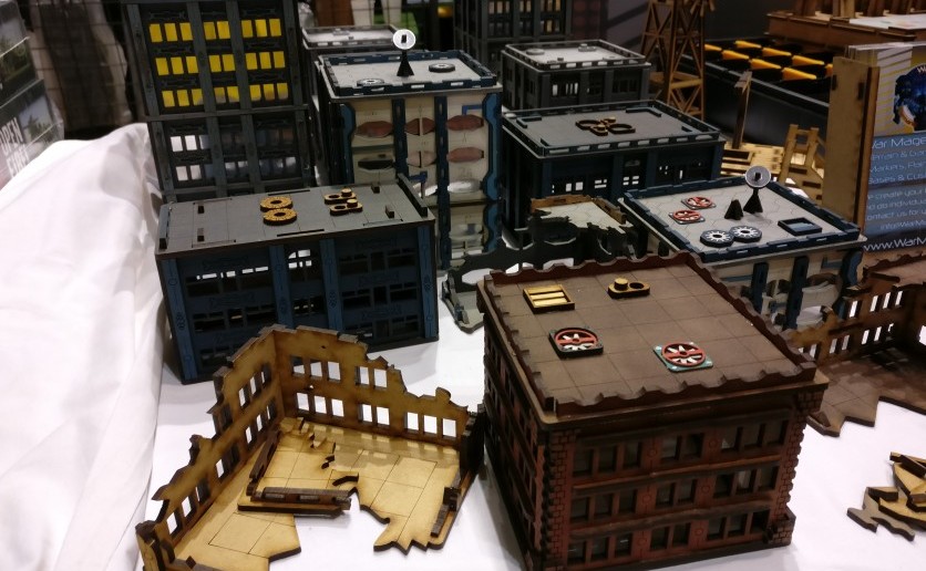 Laser-Cut-Häuser von War Mage Games für Dropzone Commander und andere Games.