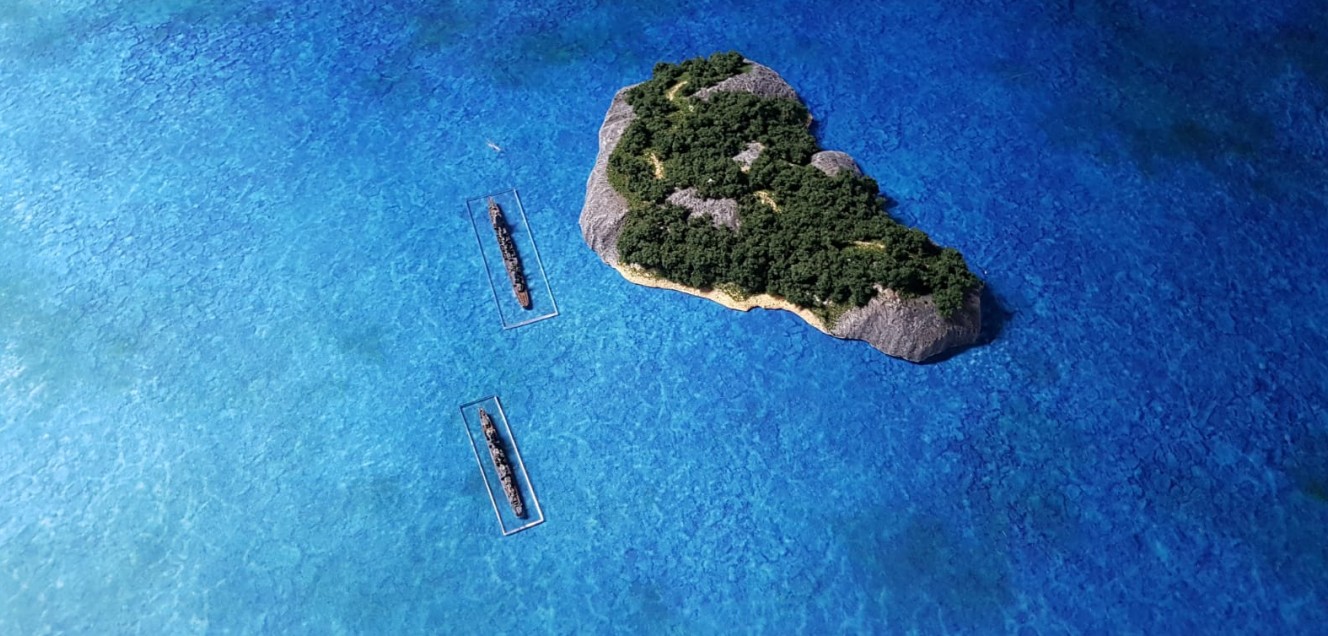 Die ozeanblaue Battlemat mit Davids Inseln vom Butt-Ape-City Archipel und den Schiffen für das Tabletop Broadside.