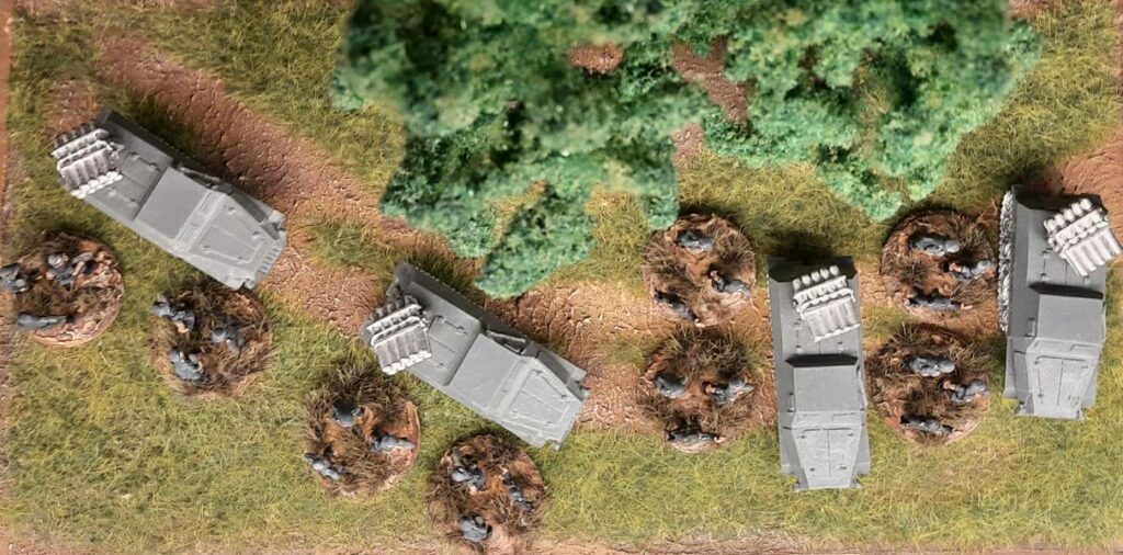 Blick von oben auf Panzerwerfer 42 und die Bedienmannschaften aus dem Set "Flames of War GBX38 WWII German Armoured Rocket Launcher Battery Guns with Crew"