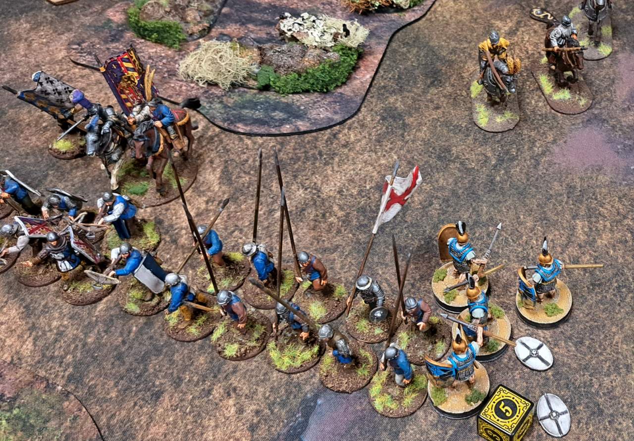 Die Veteranen setzen ihren Angriff auf die Krieger mit Piken fort.