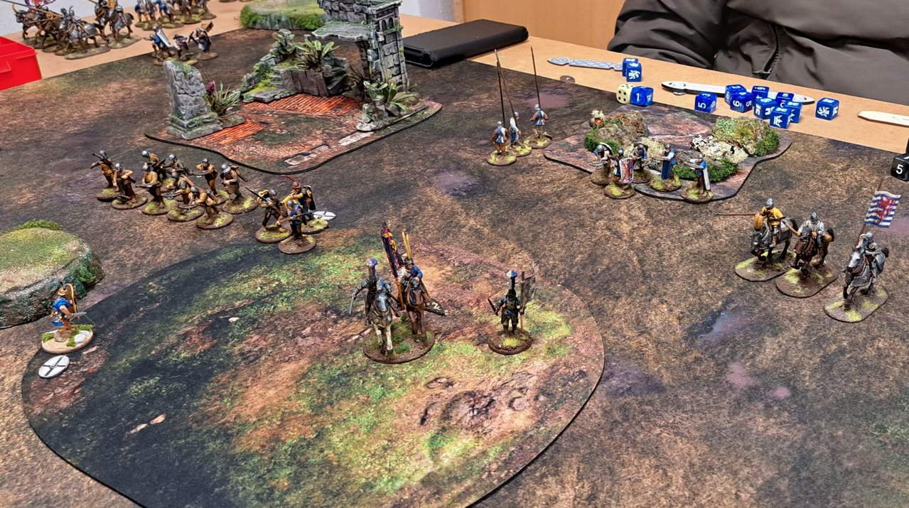 Der siegreiche burgundische Feldherr und sein Held auf dem Hügel.